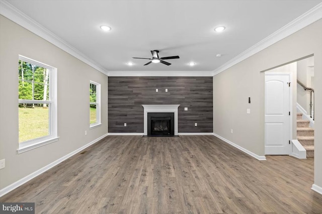 12521 Wilderness Park Dr, Spotsylvania, VA 22551 - unfurnished living room featuring a ceiling fan, crown molding, recessed lighting, stairway, and wood finished floors