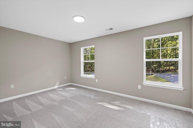 12521 Wilderness Park Dr, Spotsylvania, VA 22551 - carpeted spare room featuring baseboards
