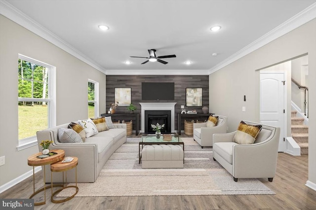 12521 Wilderness Park Dr, Spotsylvania, VA 22551 - living area with ceiling fan, recessed lighting, ornamental molding, stairway, and wood finished floors