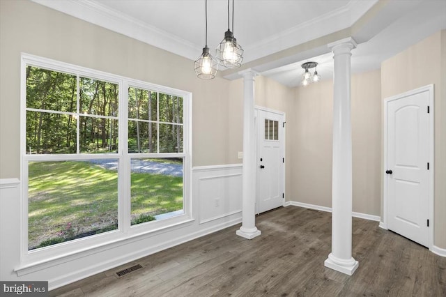 12521 Wilderness Park Dr, Spotsylvania, VA 22551 - entryway featuring decorative columns, crown molding, plenty of natural light, wood finished floors, and a chandelier