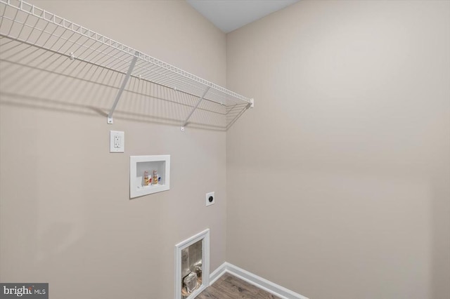 12521 Wilderness Park Dr, Spotsylvania, VA 22551 - washroom with electric dryer hookup, washer hookup, and wood finished floors