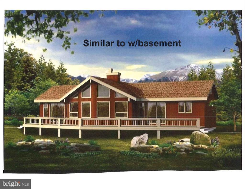  - back of property with a chimney and a deck with mountain view