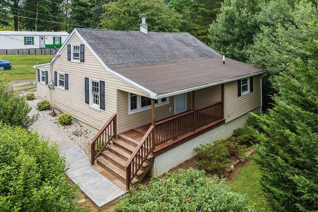 474 Stoney Run Rd, Buena Vista, VA 24416 - rear view of property with a chimney, roof with shingles, and covered porch