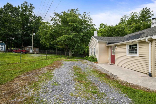 474 Stoney Run Rd, Buena Vista, VA 24416 - view of yard with driveway and view of wooded area