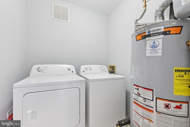 4209 Oakhill Rd, Fredericksburg, VA 22408 - laundry area with water heater and washer and clothes dryer