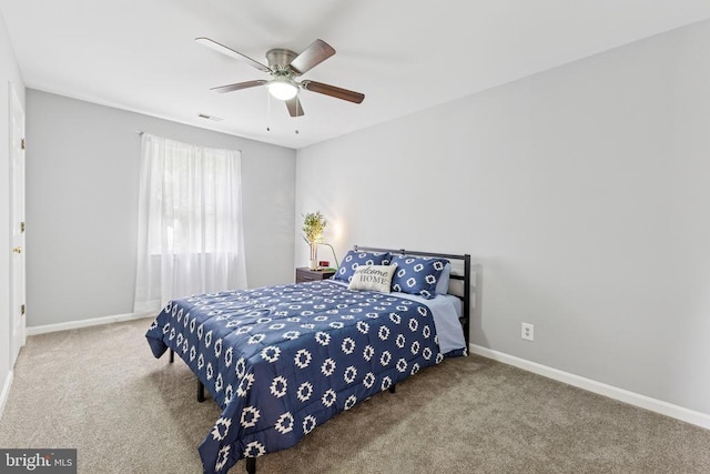 4209 Oakhill Rd, Fredericksburg, VA 22408 - carpeted bedroom with baseboards and a ceiling fan
