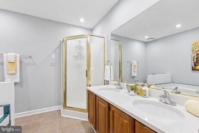 4209 Oakhill Rd, Fredericksburg, VA 22408 - full bath featuring a shower stall, a garden tub, double vanity, tile patterned flooring, and recessed lighting
