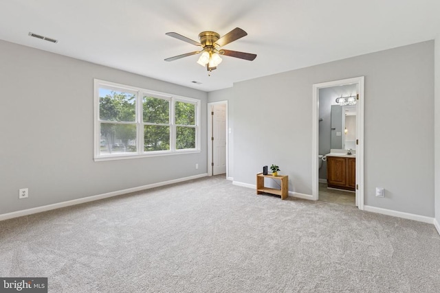 4209 Oakhill Rd, Fredericksburg, VA 22408 - unfurnished bedroom with carpet, connected bathroom, and ceiling fan