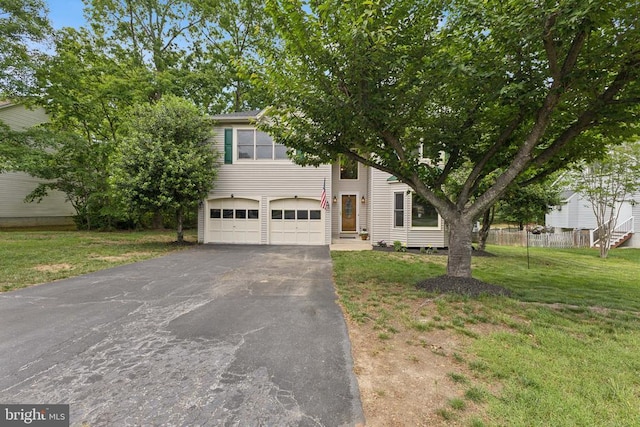 4209 Oakhill Rd, Fredericksburg, VA 22408 - view of front of house featuring asphalt driveway and an attached garage