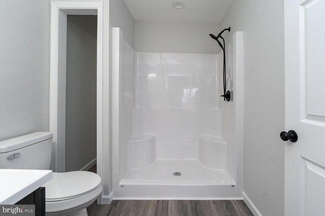 1087 Judy Ln, Stanley, VA 22851 - full bath featuring vanity, wood finished floors, a shower, and toilet