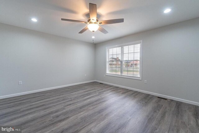 1087 Judy Ln, Stanley, VA 22851 - unfurnished room with dark wood-style floors, a ceiling fan, recessed lighting, and baseboards