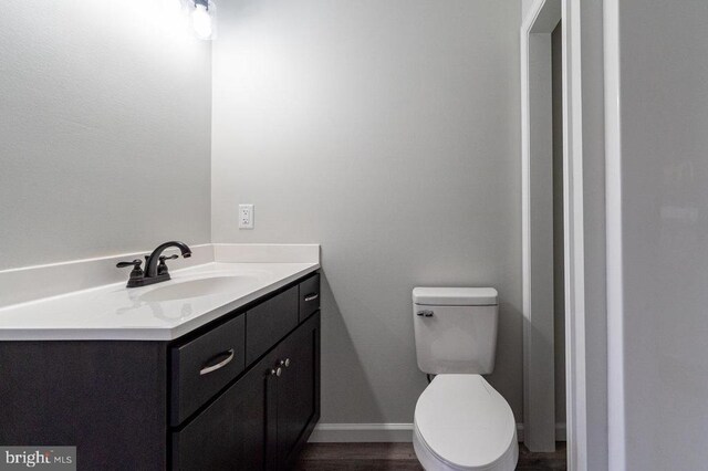 1087 Judy Ln, Stanley, VA 22851 - bathroom featuring vanity, toilet, and baseboards