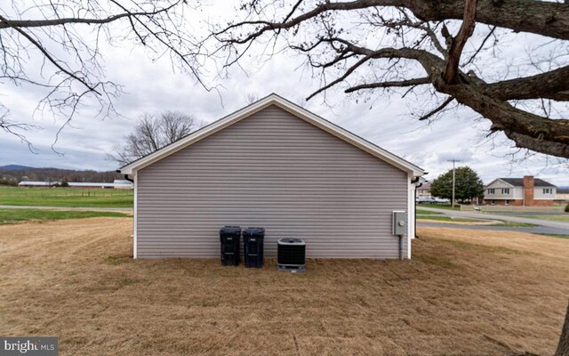 1087 Judy Ln, Stanley, VA 22851 - view of home's exterior with a yard and central air condition unit