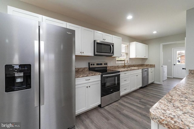 1087 Judy Ln, Stanley, VA 22851 - kitchen with appliances with stainless steel finishes, a sink, dark wood-type flooring, healthy amount of natural light, and recessed lighting