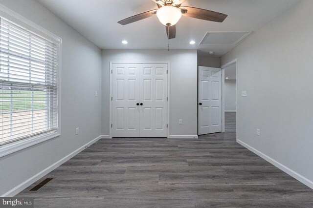 1087 Judy Ln, Stanley, VA 22851 - unfurnished bedroom with attic access, baseboards, a closet, dark wood-style flooring, and recessed lighting