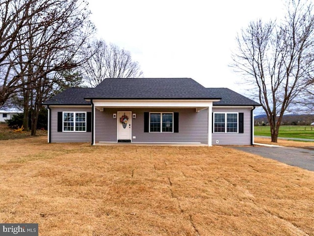 1087 Judy Ln, Stanley, VA 22851 - view of front facade featuring a mountain view, covered porch, a front yard, and cooling unit