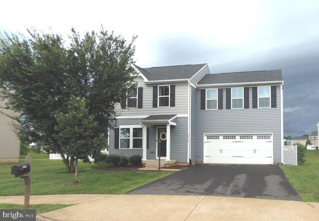 2414 Post Oak Dr, Culpeper, VA 22701 - view of front of home with driveway, a garage, and a front lawn