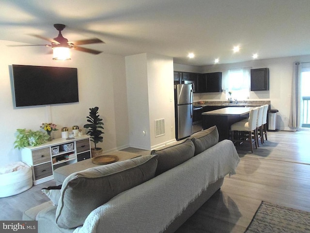 2414 Post Oak Dr, Culpeper, VA 22701 - living area with light wood-type flooring, ceiling fan, and recessed lighting