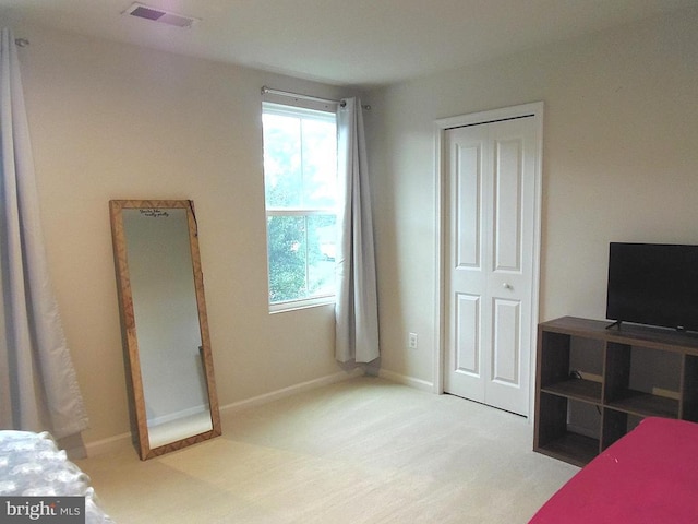 2414 Post Oak Dr, Culpeper, VA 22701 - unfurnished bedroom featuring multiple windows, carpet floors, and a closet