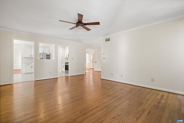 2777 Peppervine Ct, Charlottesville, VA 22911 - unfurnished living room featuring a ceiling fan, ornamental molding, and wood finished floors