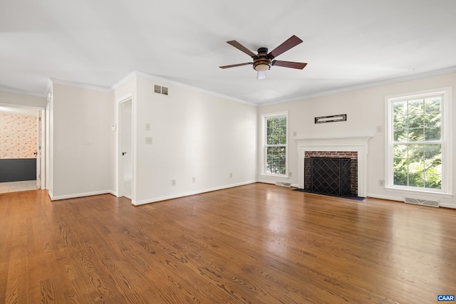 2777 Peppervine Ct, Charlottesville, VA 22911 - unfurnished living room featuring a ceiling fan, plenty of natural light, a fireplace, wood finished floors, and crown molding