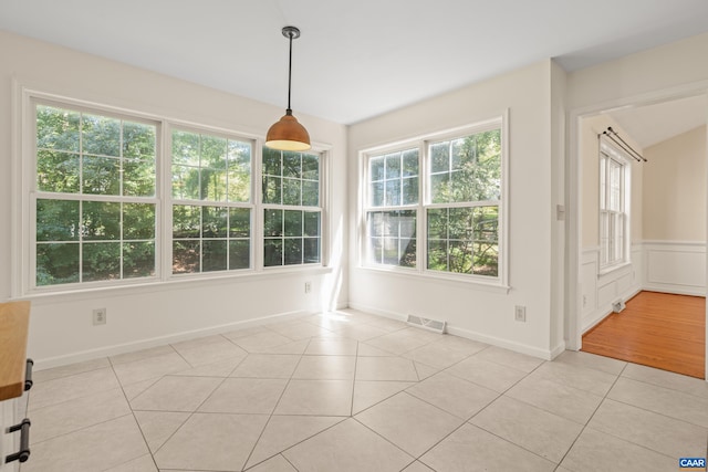 2777 Peppervine Ct, Charlottesville, VA 22911 - unfurnished dining area with light tile patterned flooring and baseboards