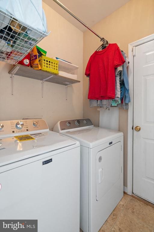 laundry area with washer and clothes dryer