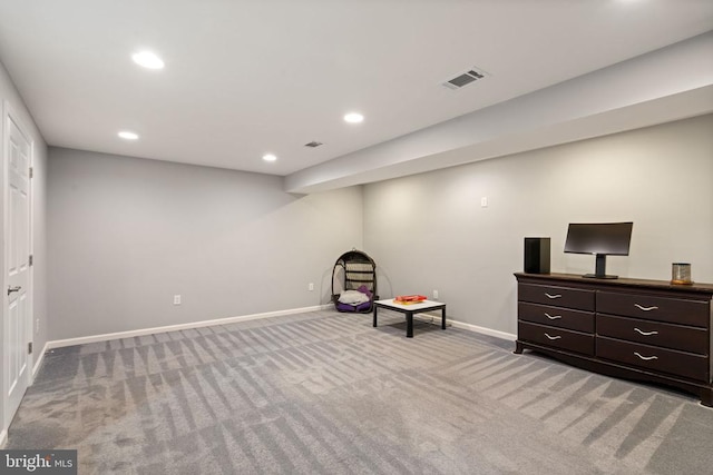 living area with carpet flooring, recessed lighting, and baseboards