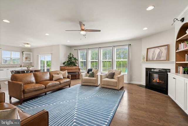 10430 Aspen Highlands Dr, Spotsylvania, VA 22553 - living area featuring ceiling fan, wood finished floors, recessed lighting, a fireplace with flush hearth, and baseboards