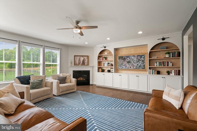 10430 Aspen Highlands Dr, Spotsylvania, VA 22553 - living area with ceiling fan, a fireplace with flush hearth, dark wood-style floors, built in features, and recessed lighting