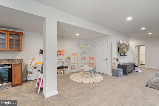 10430 Aspen Highlands Dr, Spotsylvania, VA 22553 - recreation room with wine cooler, light colored carpet, recessed lighting, baseboards, and a bar