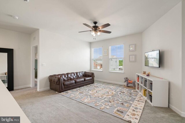 10430 Aspen Highlands Dr, Spotsylvania, VA 22553 - living area featuring ceiling fan, light carpet, and baseboards