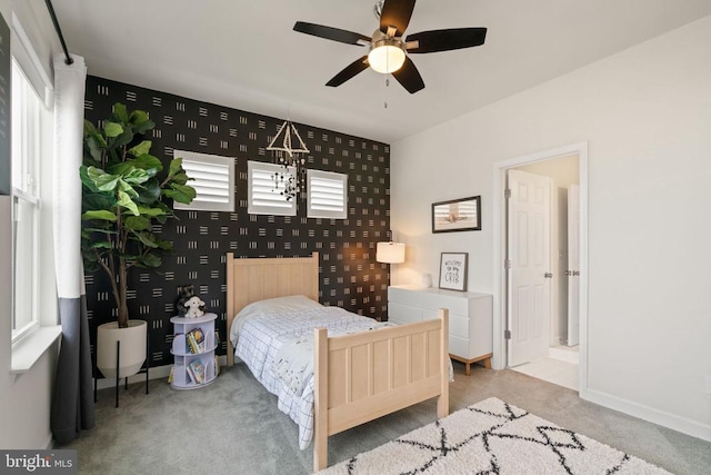 10430 Aspen Highlands Dr, Spotsylvania, VA 22553 - carpeted bedroom with an accent wall, baseboards, ceiling fan, and wallpapered walls