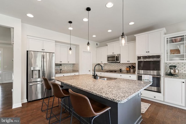 10430 Aspen Highlands Dr, Spotsylvania, VA 22553 - kitchen with appliances with stainless steel finishes, a sink, backsplash, and recessed lighting