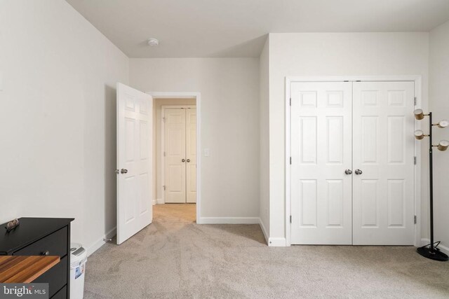 10430 Aspen Highlands Dr, Spotsylvania, VA 22553 - unfurnished bedroom with carpet, a closet, and baseboards