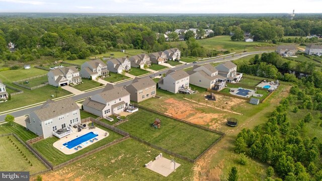 10430 Aspen Highlands Dr, Spotsylvania, VA 22553 - aerial perspective of suburban area with a pool area and a heavily wooded area