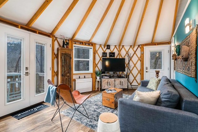 431 Lower Rawley Ln, Hinton, VA 22831 - living area with a baseboard radiator, french doors, vaulted ceiling with beams, and wood finished floors