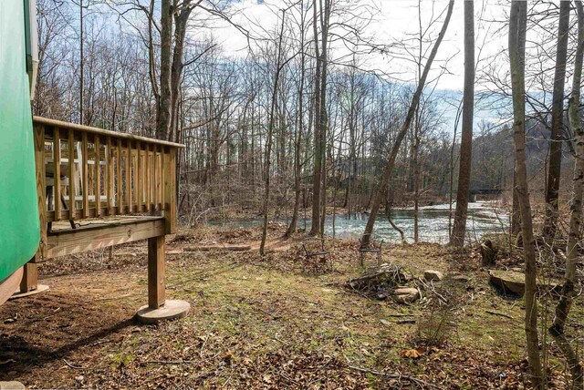 431 Lower Rawley Ln, Hinton, VA 22831 - view of yard featuring a wooded view and a deck with water view