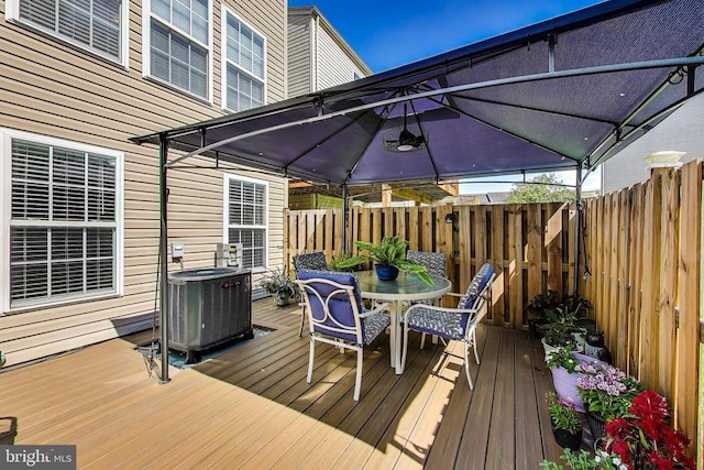 11222 Gander Ct, Fredericksburg, VA 22407 - wooden terrace with outdoor dining area and a gazebo