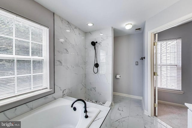 11222 Gander Ct, Fredericksburg, VA 22407 - bathroom with a bath, marble look tiles, and a marble finish shower