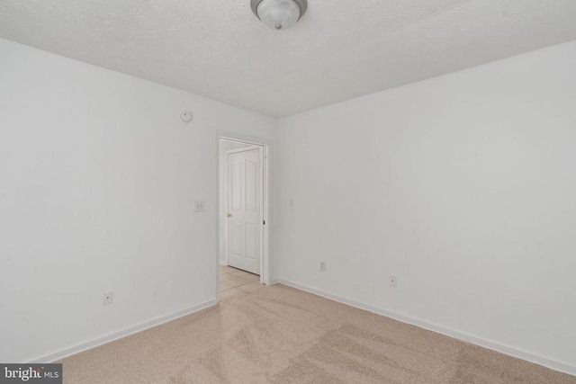 6701 Towles Mill Rd, Spotsylvania, VA 22551 - spare room featuring light colored carpet and baseboards