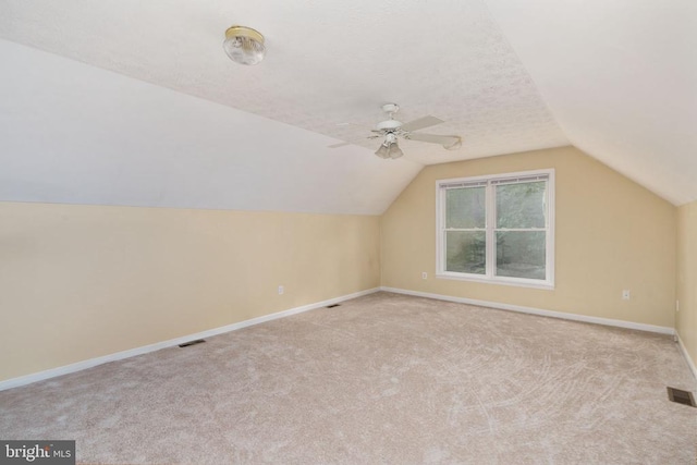 6701 Towles Mill Rd, Spotsylvania, VA 22551 - additional living space with lofted ceiling, baseboards, carpet floors, and ceiling fan