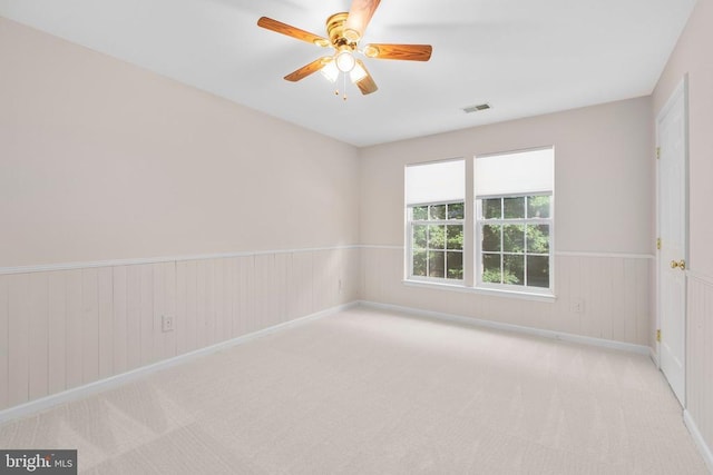 10911 Jarvis Ct, Fredericksburg, VA 22407 - unfurnished room featuring a wainscoted wall, carpet, and ceiling fan