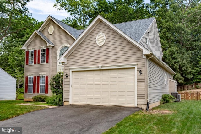 10911 Jarvis Ct, Fredericksburg, VA 22407 - traditional-style house featuring driveway, roof with shingles, and a garage