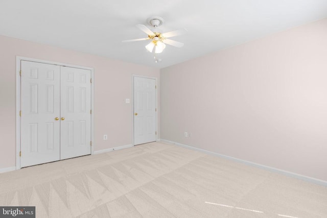 10911 Jarvis Ct, Fredericksburg, VA 22407 - unfurnished bedroom with light carpet, a closet, and ceiling fan