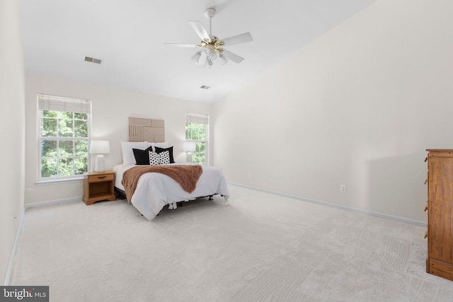 10911 Jarvis Ct, Fredericksburg, VA 22407 - bedroom featuring light colored carpet, lofted ceiling, multiple windows, and ceiling fan