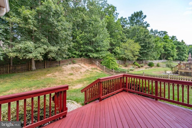 10911 Jarvis Ct, Fredericksburg, VA 22407 - wooden deck with a fenced backyard and view of scattered trees
