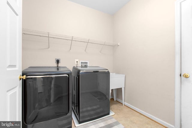 10911 Jarvis Ct, Fredericksburg, VA 22407 - laundry area with washing machine and dryer and baseboards
