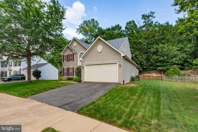 10911 Jarvis Ct, Fredericksburg, VA 22407 - view of front facade featuring asphalt driveway and an attached garage