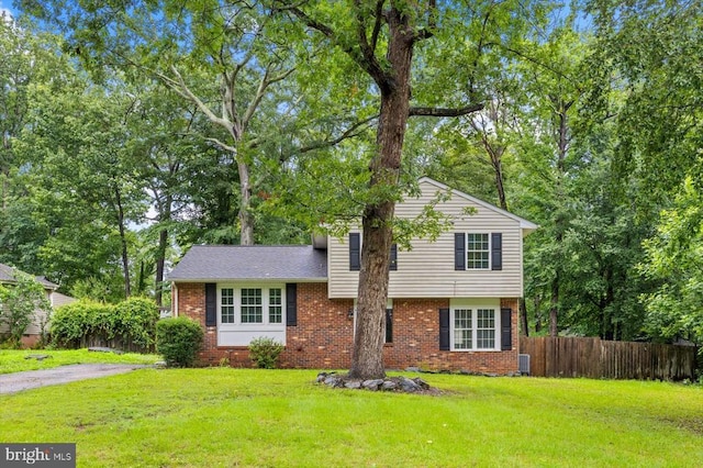 6908 Wild Turkey Dr, Spotsylvania, VA 22553 - tri-level home featuring brick siding